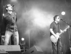 Noasis tribute Band on fire on stage