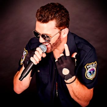 George M impersonator and singer Johnny with mic